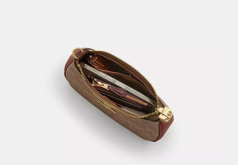 Teri Mini Crossbody Bag In Signature Canvas